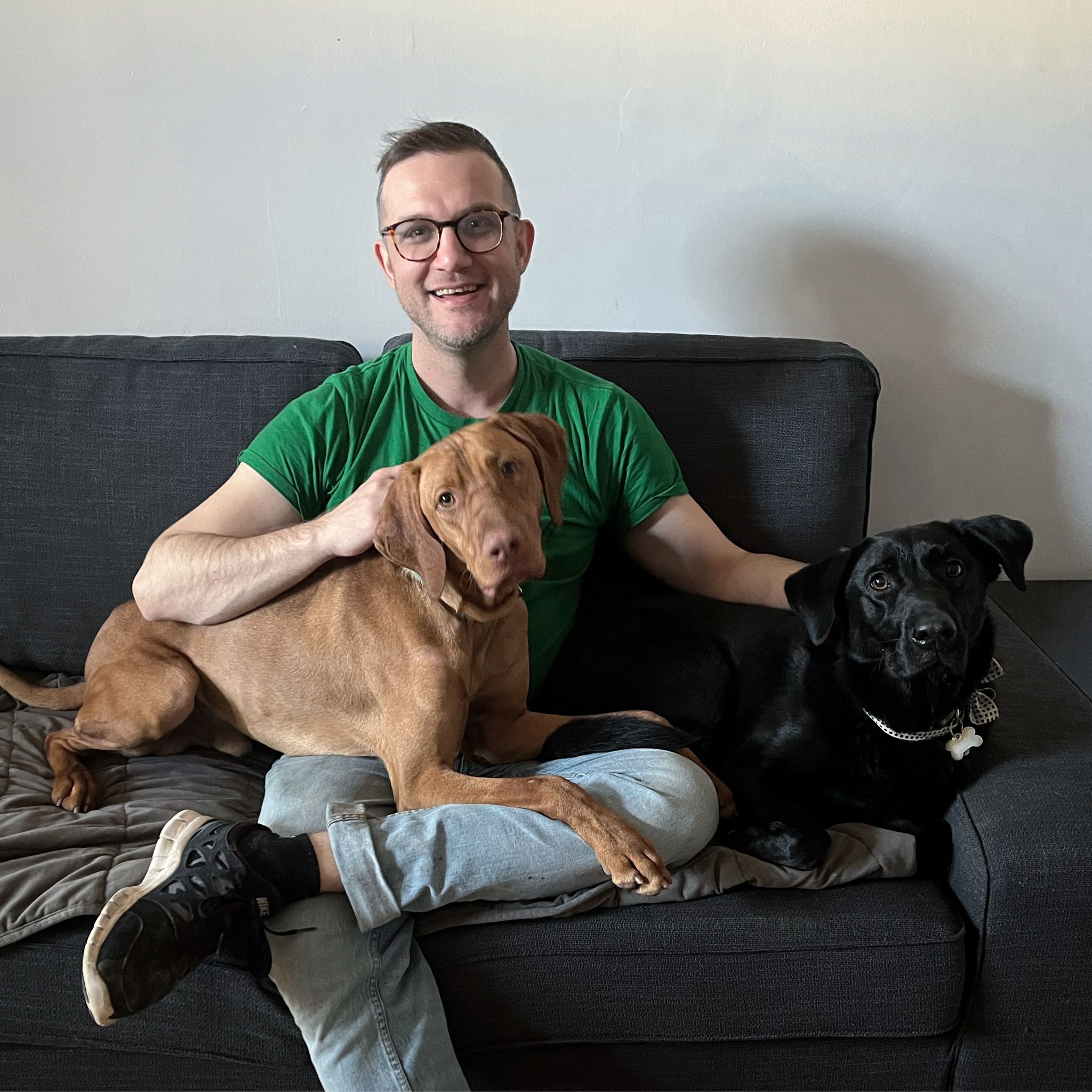 Joshua with his dogs, LP (visla) and Crunch (black lab)